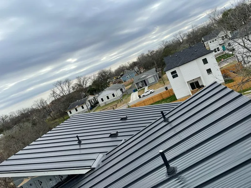 Standing seam metal roof panels with vents for Skylight Repair in Alpena